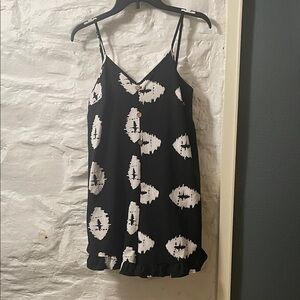 4/$20 sale Chic Black and White Patterned Romper